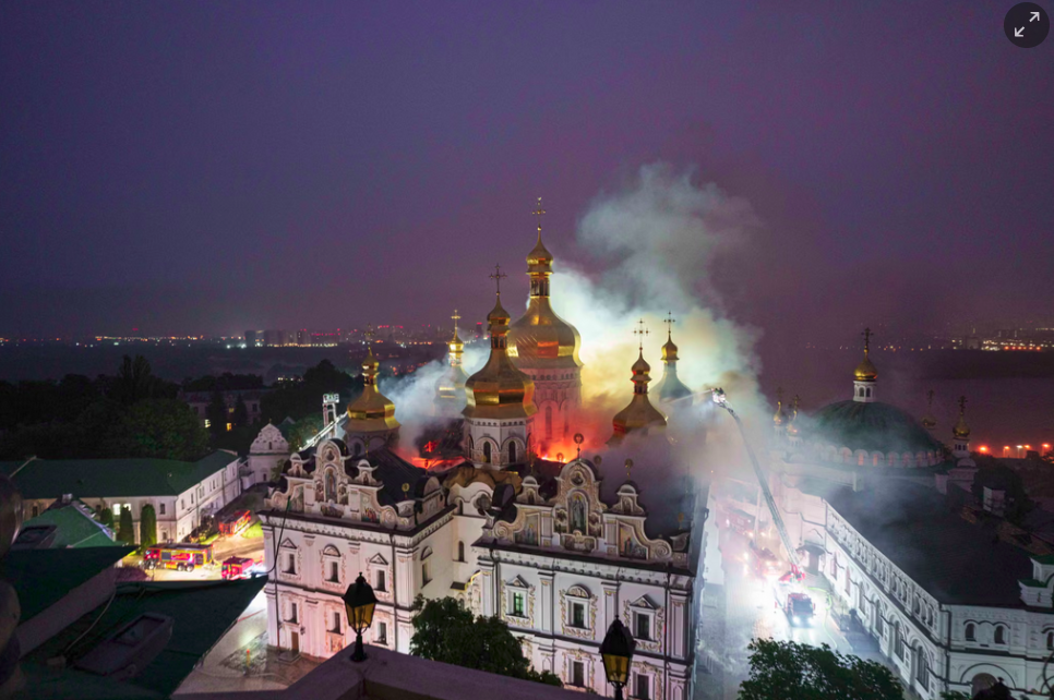 Firefighters attempt to put out a fire at the Dormition Cathedral in the Pecherska Unesco world heritage site and one of Ukraine’s most significant cultural sites. Photo by Evgeniy Maloletka/AP / The Guardian